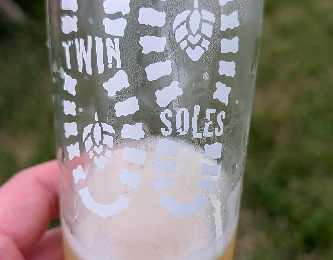Pint glass etched with the Twin Soles Brewing logo at the Frankford, NJ taproom