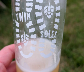 Pint glass etched with the Twin Soles Brewing logo at the Frankford, NJ taproom
