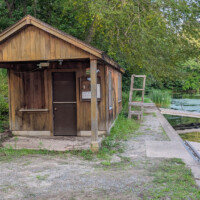 Kayak rental booth on the shore of Swartswood Lake.